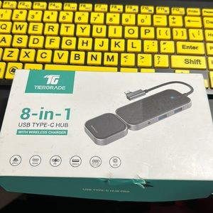 NIB 8-In-1 USB TYPE-C HUB with wireless charger.